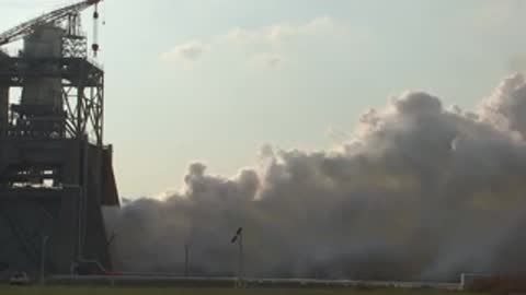 Medium view of the test stand against a cloudy sky.