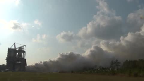 Medium view of smoke dissipating from the test facility.
