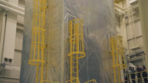 wide view of the tall protective structure in the testing facility