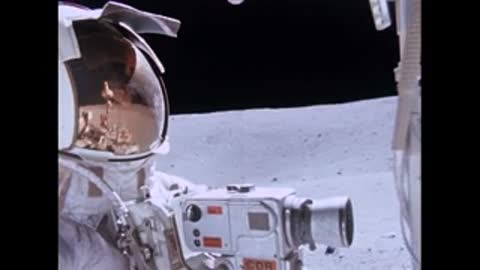 Lunar rover driving and scientific equipment on moon.
