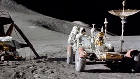 Lunar rover parked on the moon surface.