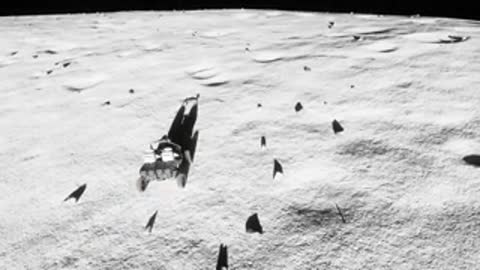 Lunar rover traversing cratered terrain with long shadows.