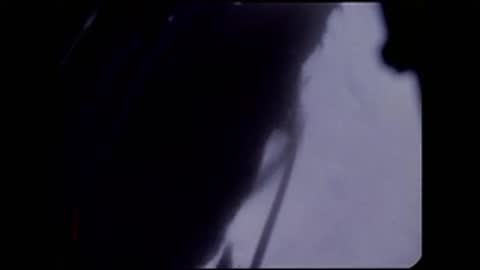 Archival video of a lunar landscape viewed from above