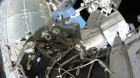 Equipment modules attached to the exterior of the space station in orbit.