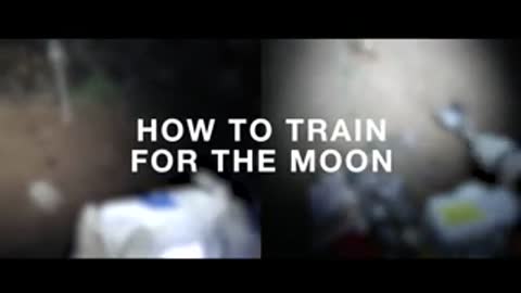 Title card displaying text over blurred nighttime field test scene with lights.