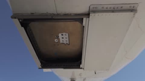 Underbelly sensor port doors opening and closing on the airplane.