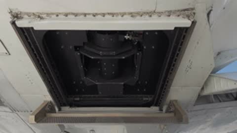 Underbelly sensor equipment operating during flight.