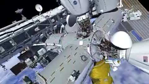 Wide view of ISS modules against Earth horizon