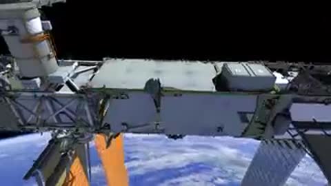 Panel maintenance activity on the ISS exterior structure.