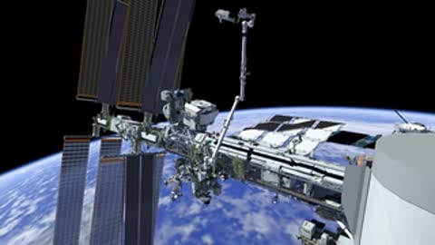 Robotic arm extending from station truss into space.