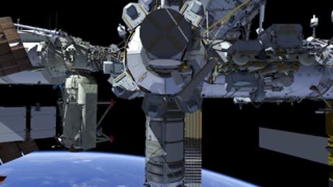 Close-up of ISS central module and solar arrays