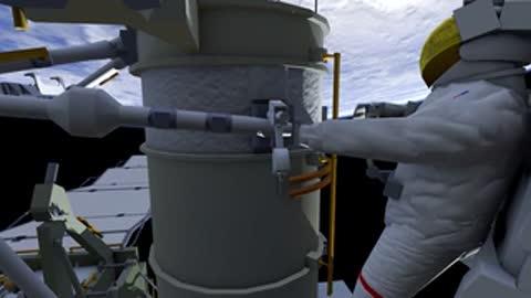 Astronaut securing tether to handrail mounting point