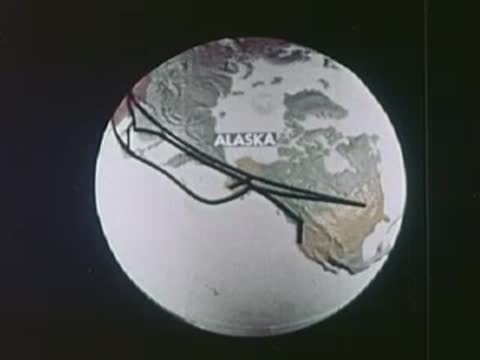 An animated globe showing the North American continent and Alaska.