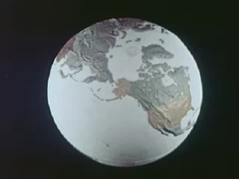 Rotating globe showing North America and zooming in on Alaska region