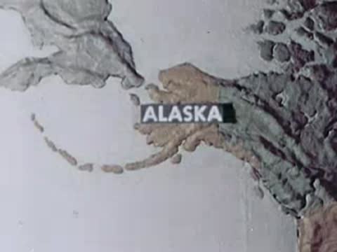 Relief map of Alaska with United States outline comparison
