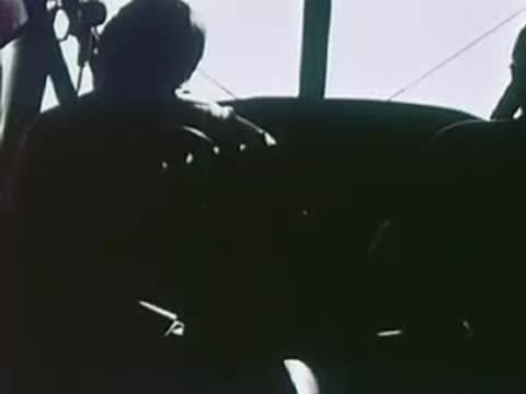 Silhouette of a person in the cockpit of a plane, aviation, 1940s