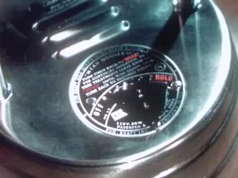 Close-up of the dial and control panel of a portable ultraviolet therapy lamp.