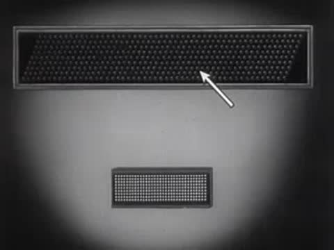Animation showing a control mechanism connecting to a lit display screen.