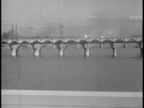 Artistic optical wipe transition showing a vintage bus moving across bridge arches.