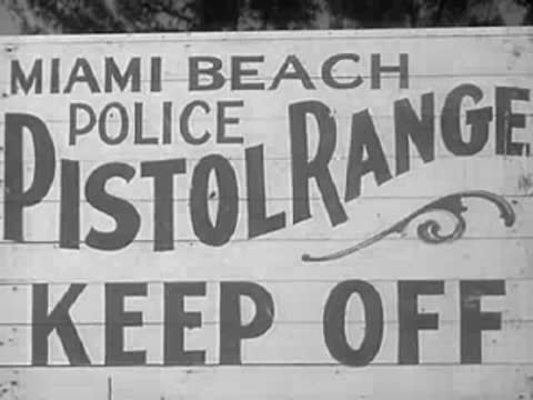 A sign reading Miami Beach Police Pistol Range Keep Off.