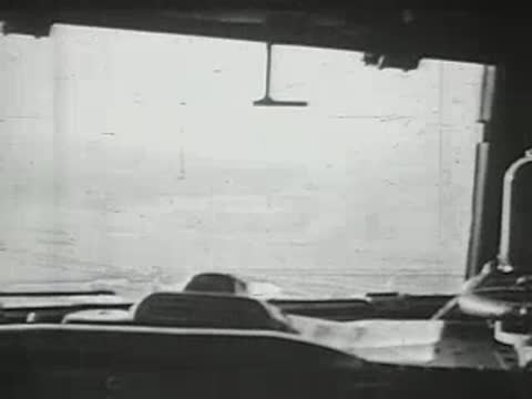 View from inside cockpit looking straight ahead during flight.