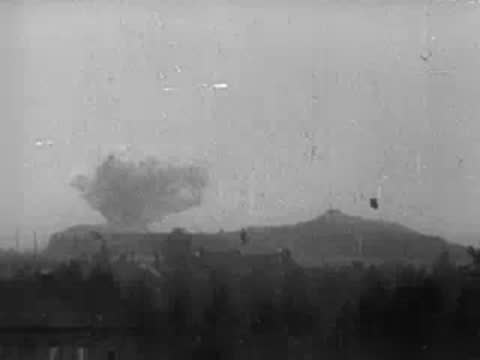 Explosion on a distant hill, archive footage