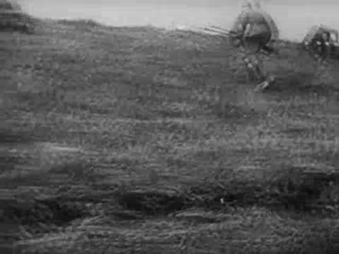 Soldiers cross river by boat and aircraft fly, archive footage