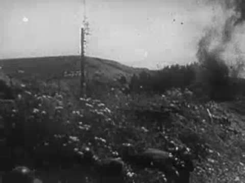 Soldiers in a trench during an explosion, archive footage