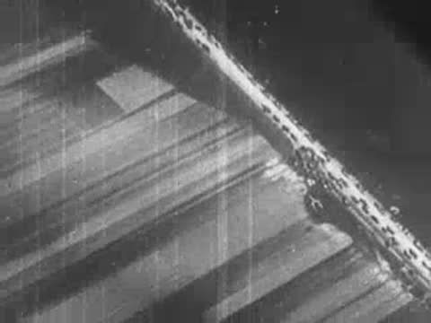 aerial view of railroad tracks and rural landscape during World War II