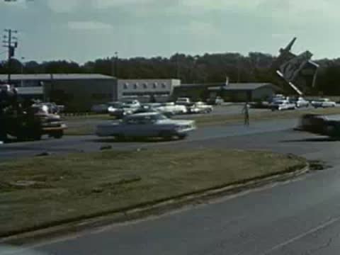 vintage cars driving on road, period vehicles