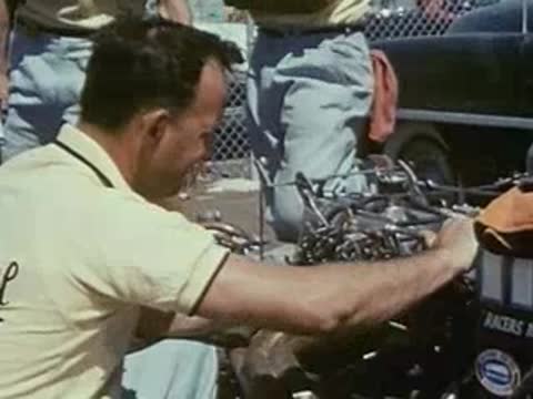 people and race car at event, vintage gathering