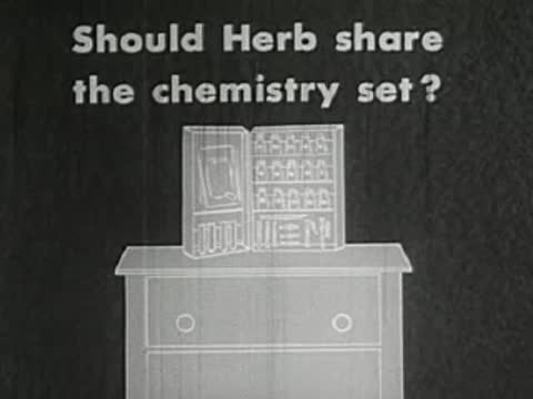 Intertitle question on screen asking if Herb should share chemistry set.