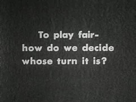 Intertitle card featuring three questions about playing fair and sharing.