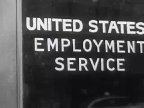 Sign for the United States Employment Service on a glass door or window