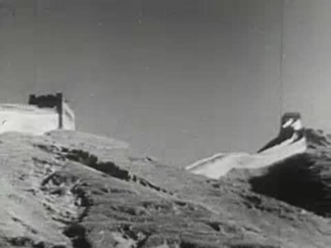 The Great Wall of China snaking across a barren ridge