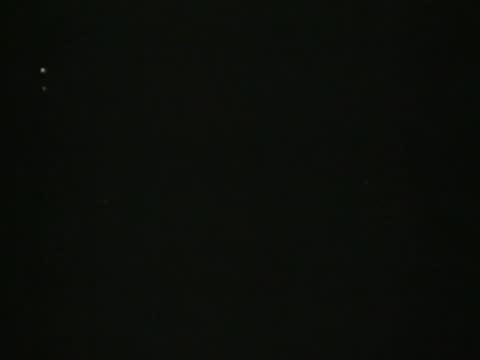 fading text overlay on globe dissolving into dark background