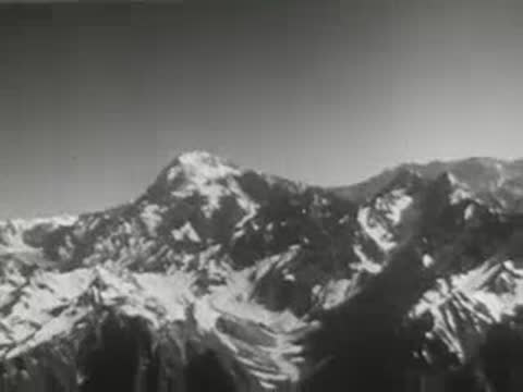 Snow-capped mountain range under a clear sky