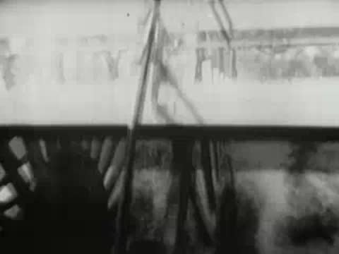 paddle wheel mechanism of a steamship operating on a river