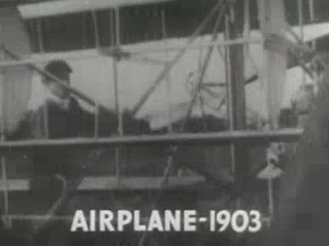 Pioneering biplane structure with people nearby and overlaid archival text, early aviation history