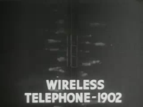 Telegraph pole and wires against a dark background with overlaid archival text, early wireless communication