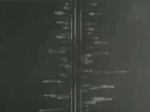 Telegraph pole and wires against a dark background, early wireless communication infrastructure