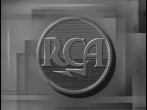 RCA emblem mounted on a wall in a studio setting.