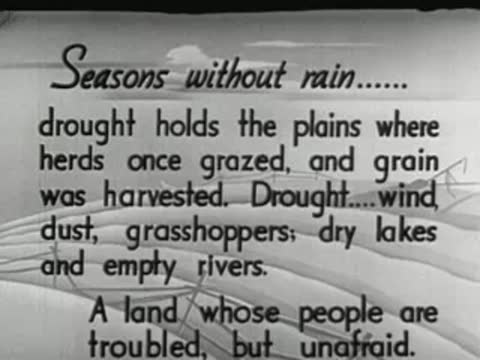Intertitle text on drought, plains, herds, grain, wind, grasshoppers.