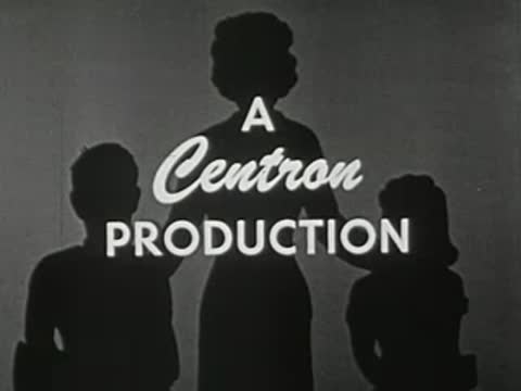 A Centron Production title card over silhouette of students and teacher.