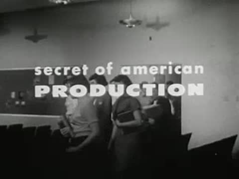 Students entering classroom with text overlay 'secret of American PRODUCTION'