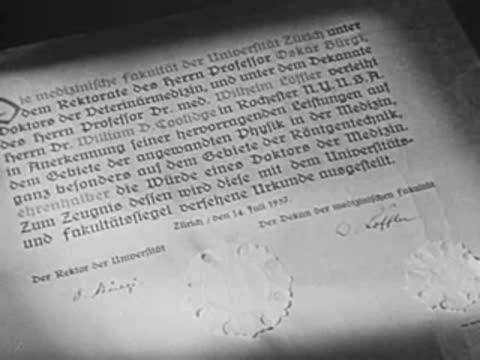 Close-up of a vintage German scientific diploma or certificate document.