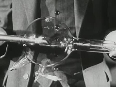 Macro shot of internal metallic components inside a glass X-ray tube.
