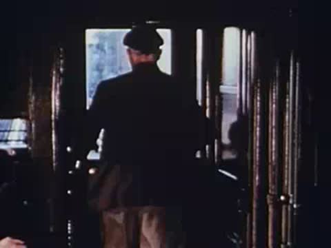 man boarding train car interior view, period details