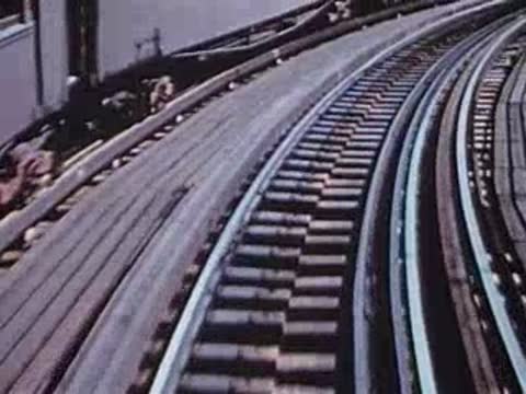 curving elevated railway tracks from moving train