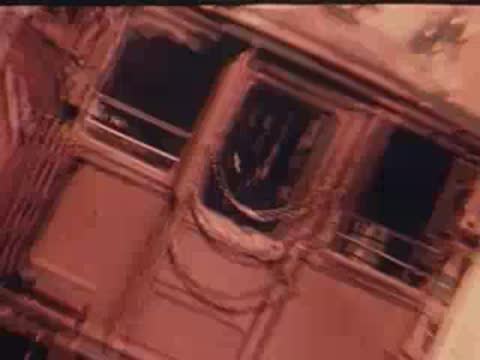 train passing on parallel tracks from moving train view